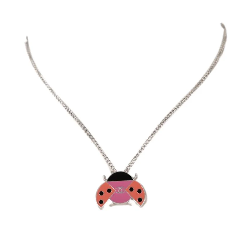 Chanel Silver Butterfly Logo Necklace