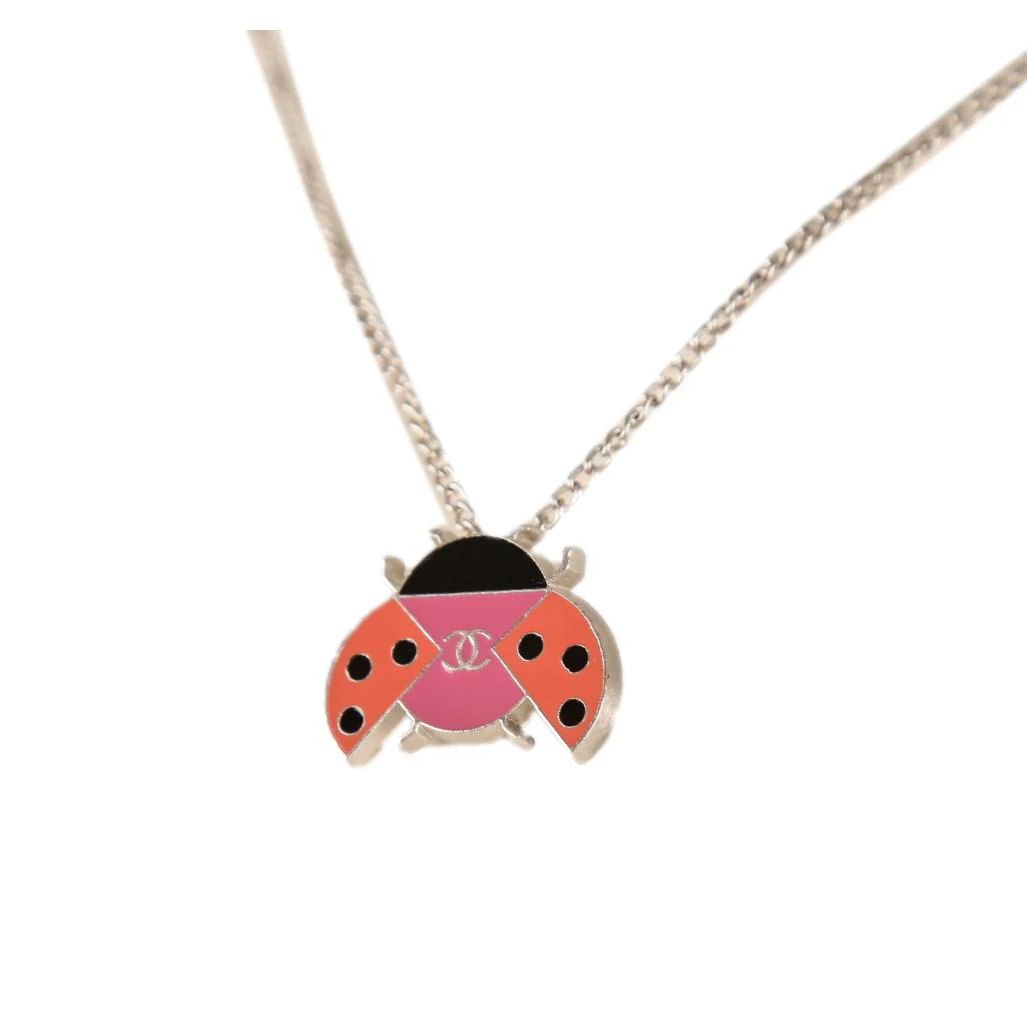 Chanel Silver Butterfly Logo Necklace - Image 2