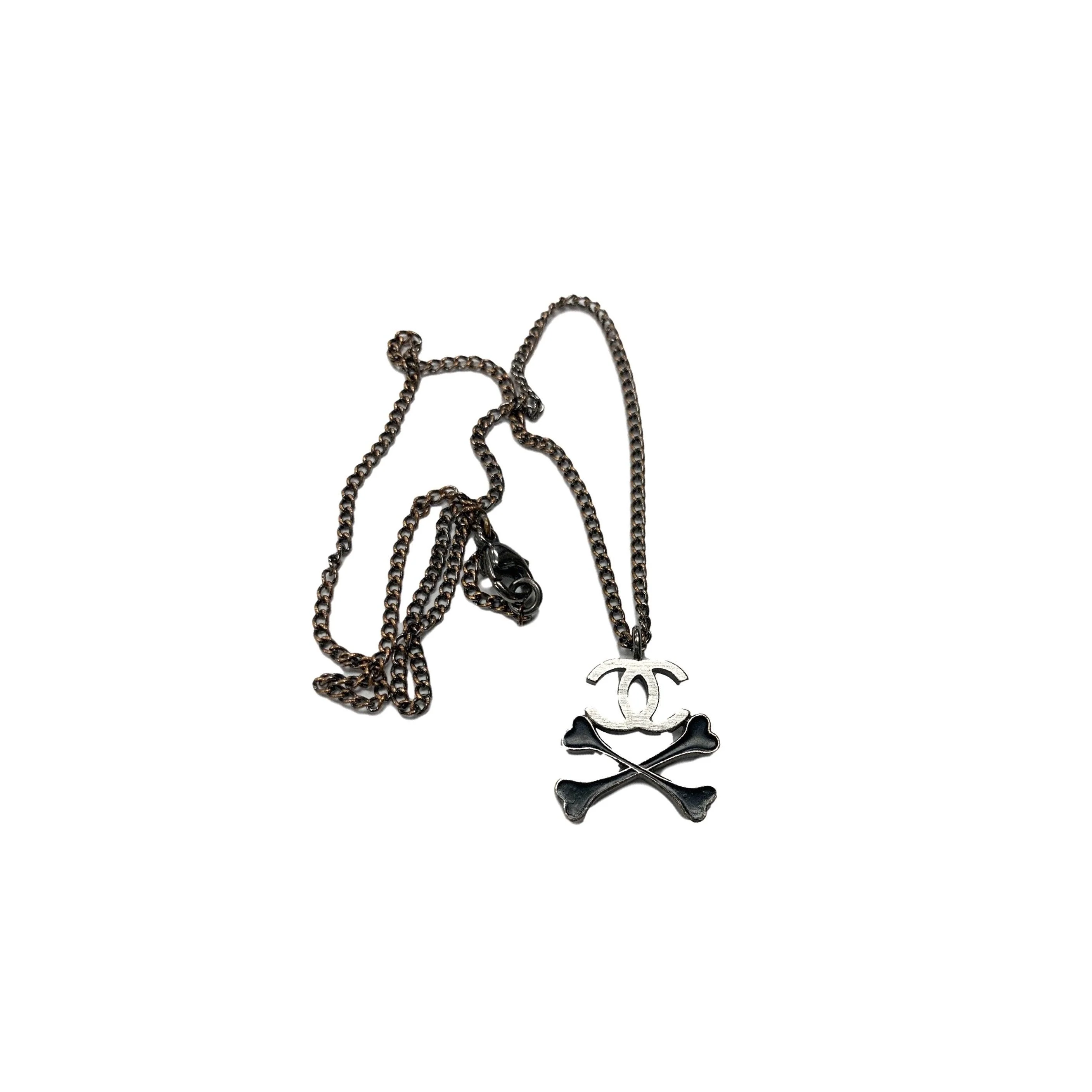 Chanel Silver Logo Skull Necklace